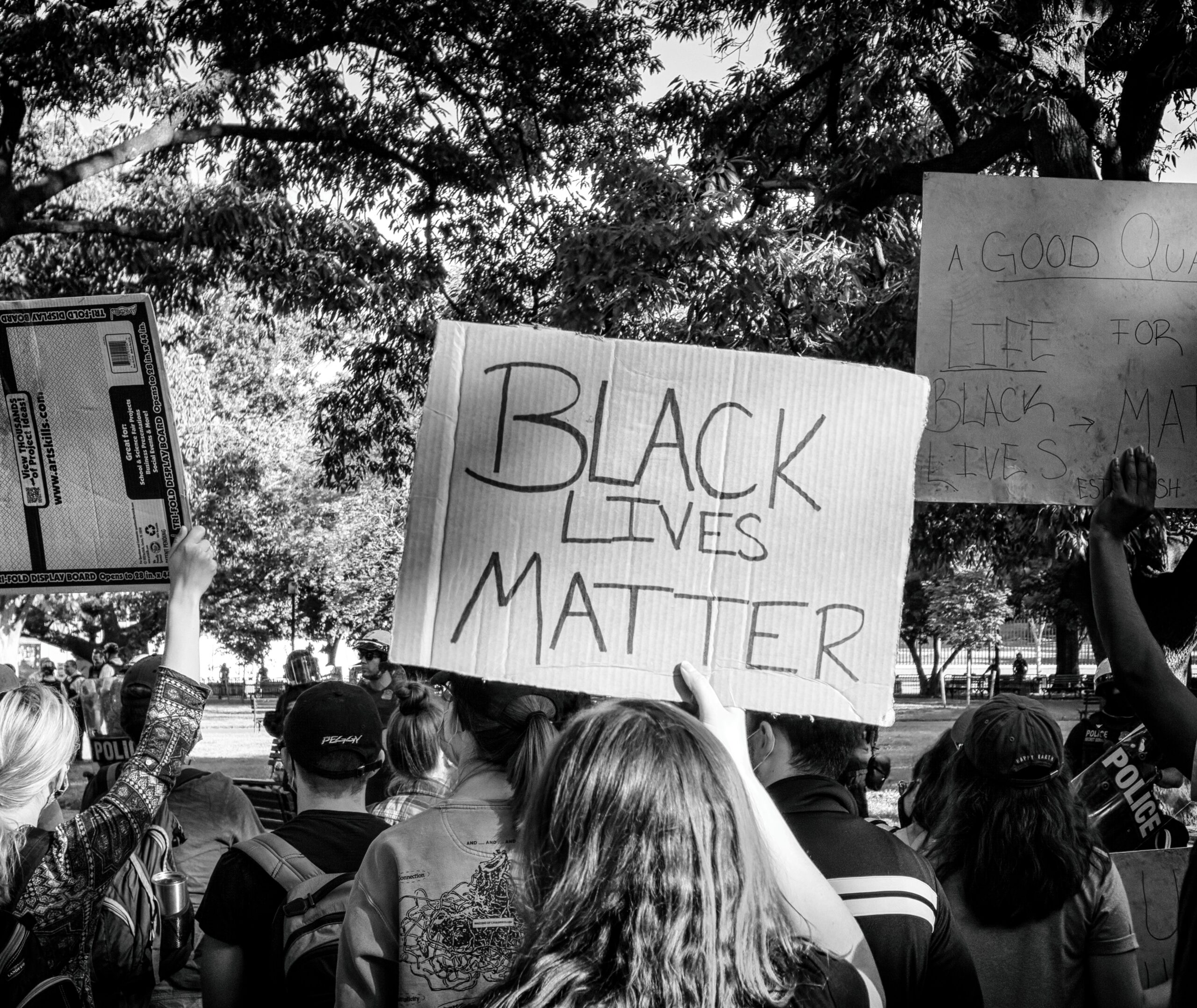 Woman Holds Black Lives Matter Sign